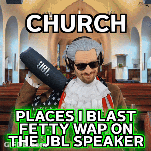 A Man Holding A Jbl Speaker In A Church GIF