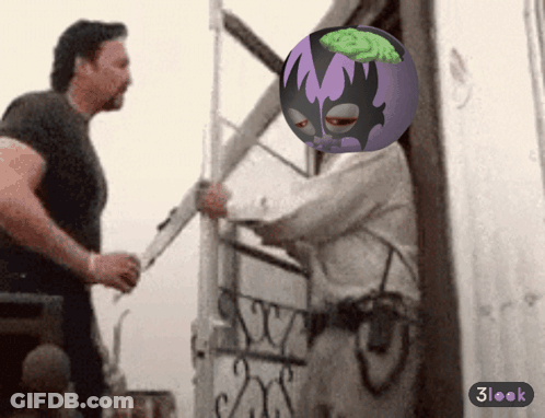 A Man Holding A Knife Next To A Purple Ball With A Green Brain In It GIF