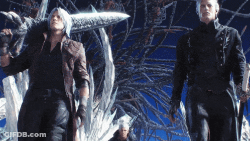 A Man Holding A Large Sword Stands Between Two Other Men GIF