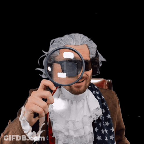 A Man Holding A Magnifying Glass In Front Of His Face With The Words That 'S Agi Above Him GIF