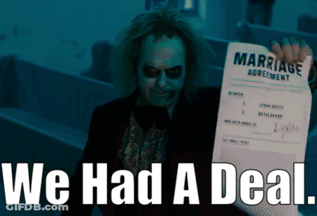 A Man Holding A Marriage Agreement With The Words We Had A Deal GIF