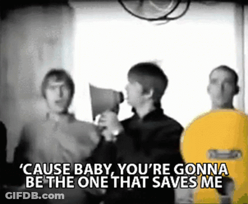 A Man Holding A Megaphone With The Words " Cause Baby You 'Re Gonna Be The One That Saves Me " Above Him GIF