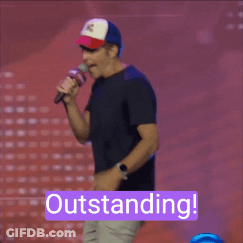 A Man Holding A Microphone With The Word Outstanding On The Bottom GIF