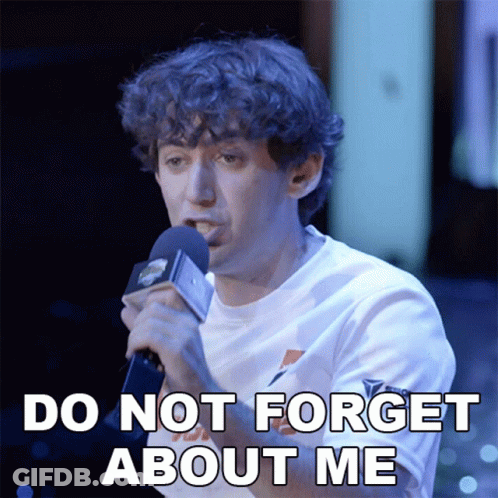 A Man Holding A Microphone With The Words Do Not Forget About Me Below Him GIF