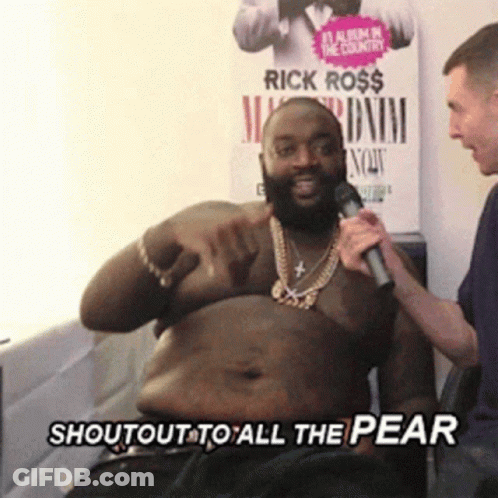A Man Holding A Microphone With The Words Shoutout To All The Pear Written Below Him GIF
