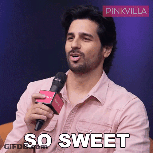 A Man Holding A Microphone With The Words So Sweet Below Him GIF