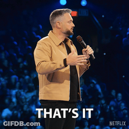 A Man Holding A Microphone With The Words That 'S It Written Below Him GIF