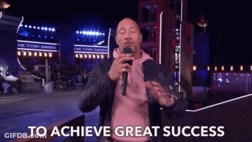 A Man Holding A Microphone With The Words To Achieve Great Success Below Him GIF