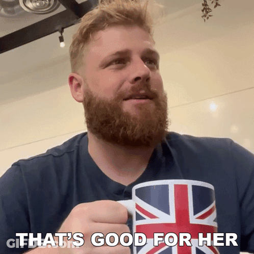 A Man Holding A Mug That Says That 'S Good For Her On It GIF