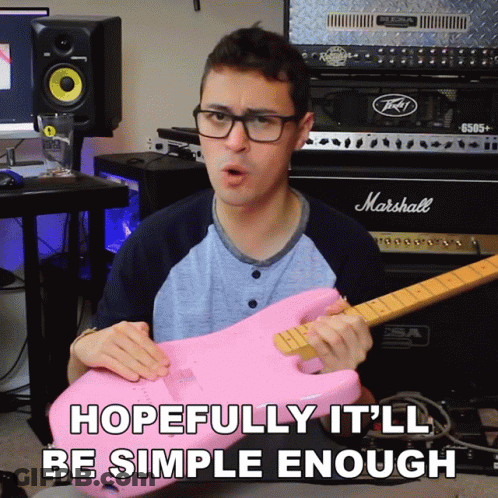 A Man Holding A Pink Guitar In Front Of A Marshall Amp GIF