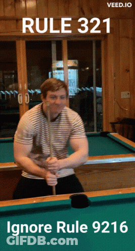 A Man Holding A Pool Cue In Front Of A Pool Table With The Words Rule 321 Ignore Rule 9216 Below Him GIF