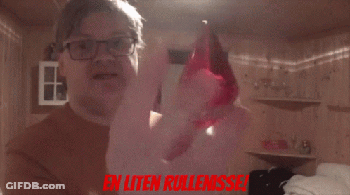 A Man Holding A Red Object With The Words En Uten Rullenisse In Red GIF