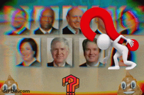 A Man Holding A Red Question Mark In Front Of A Bunch Of People GIF