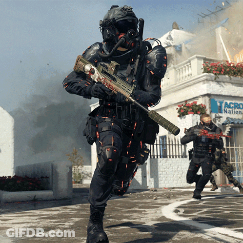 A Man Holding A Rifle In Front Of A Building That Says Acronational GIF
