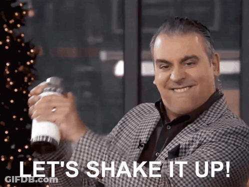 A Man Holding A Shaker With The Words Let 'S Shake It Up On The Bottom GIF