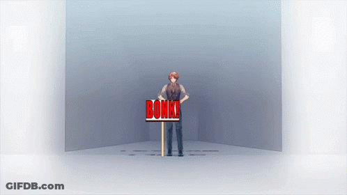 Man Holding Bonk Sign In Red GIF