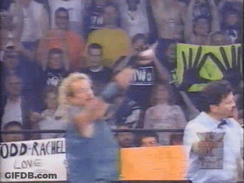 A Man Holding A Sign That Says Odd Rachel Love GIF