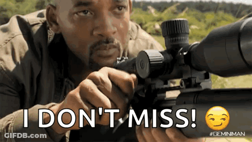 A Man Holding A Sniper Rifle With The Words " I Don 'T Miss " On The Bottom GIF
