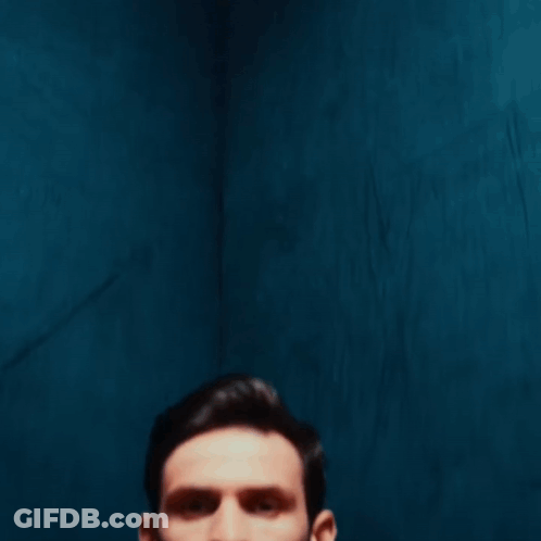 A Man Holding A Soccer Ball That Says Air Way On It GIF