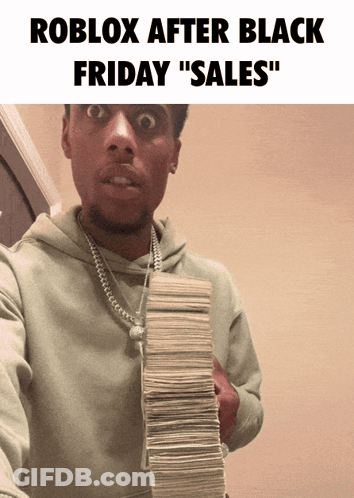 A Man Holding A Stack Of Money With The Words Roblox After Black Friday Sales GIF