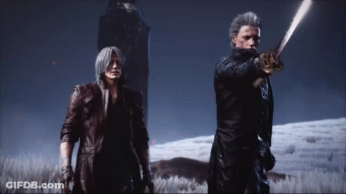 A Man Holding A Sword Stands Next To Another Man In A Field GIF
