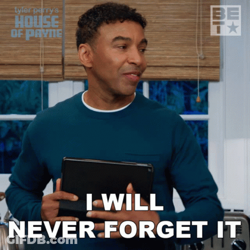 A Man Holding A Tablet With The Words I Will Never Forget It GIF