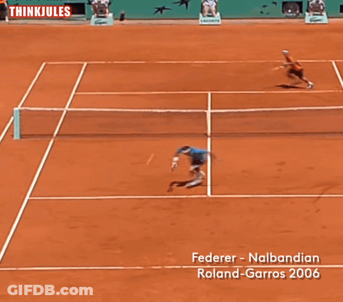 A Man Holding A Tennis Racquet In Front Of A Fedex Banner GIF
