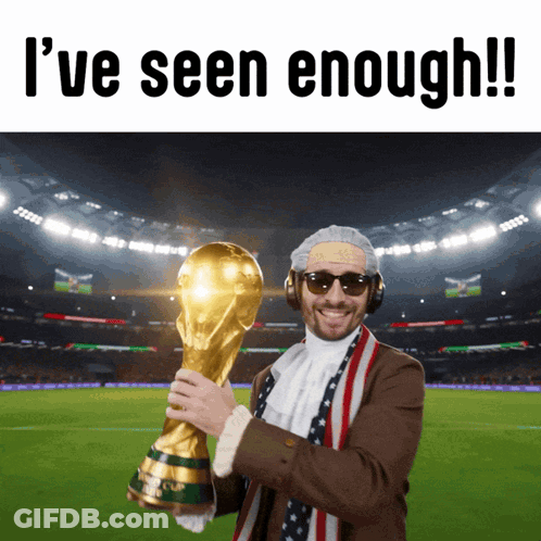 A Man Holding A Trophy That Says ' I 'Ve Seen Enough ' On The Top GIF