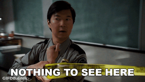 A Man Holding A Yellow Tape That Says Nothing To See Here On It GIF