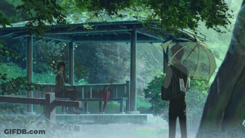 A Man Holding An Umbrella Stands Next To A Woman Sitting On A Bench In The Rain GIF