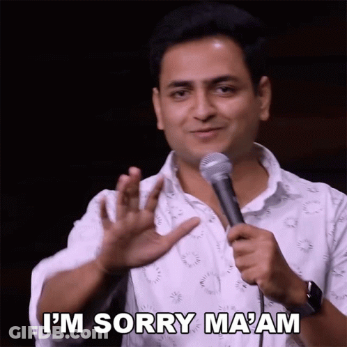 A Man Holds A Microphone And Says I 'M Sorry Ma Am GIF