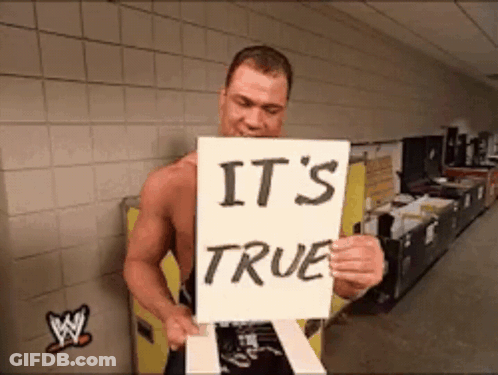 A Man Holds A Sign That Says It 'S True GIF
