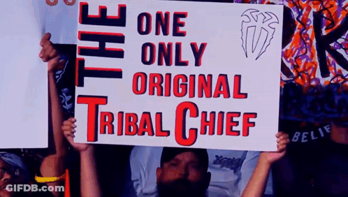 A Man Holds A Sign That Says One Only Original Tribal Chief GIF