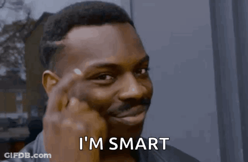 A Man Holds His Finger To His Forehead With The Words I 'M Smart Above Him GIF