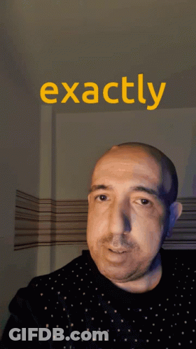 A Man Holds His Finger To His Nose In Front Of A Sign That Reads Exactly GIF