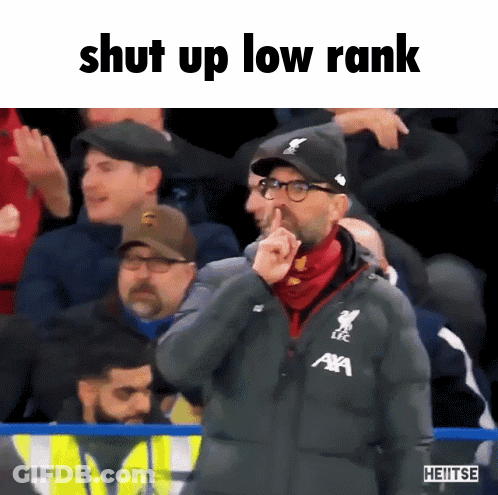 A Man Holds His Finger To His Nose With The Words Shut Up Low Rank Below Him GIF