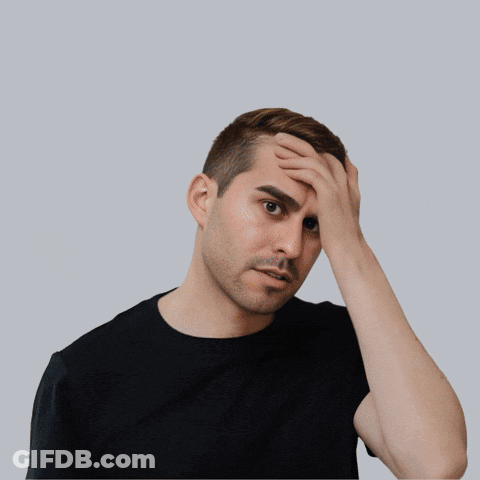 A Man Holds His Hand To His Forehead With The Words When Someone Says Blockchain Is A Scam Above Him GIF