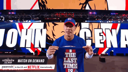 A Man Holds Up A Shirt That Says The Last Time Is GIF