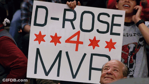 A Man Holds Up A Sign That Says " D-Rose 4 Mvp " GIF