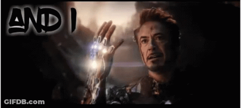 A Man Holds Up His Hand In Front Of A Sign That Says ' And I ' GIF