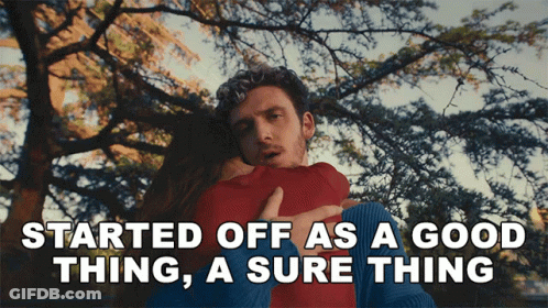 A Man Hugging A Woman With The Words Started Off As A Good Thing A Sure Thing Below Him GIF