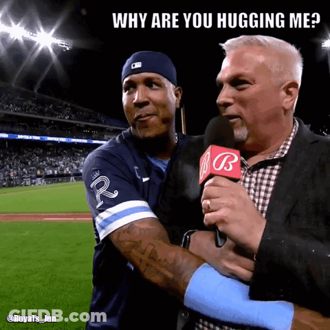A Man Hugging Another Man With The Words Why Are You Hugging Me At The Top GIF