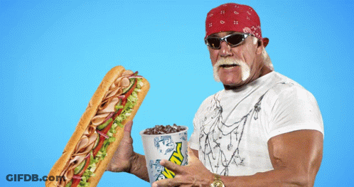A Man In A Bandana Is Holding A Subway Sandwich And A Cup Of Iced Tea GIF