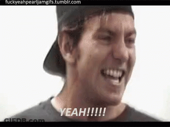 A Man In A Baseball Cap Is Smiling And Saying Yeah !!! GIF