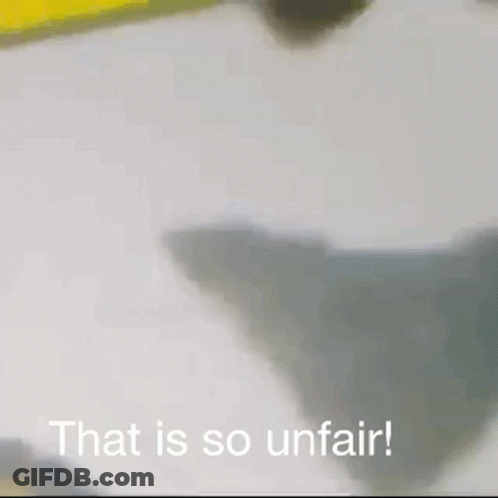 A Man In A Baseball Cap Is Standing In A Kitchen With The Words That Is So Unfair Written Below Him . GIF