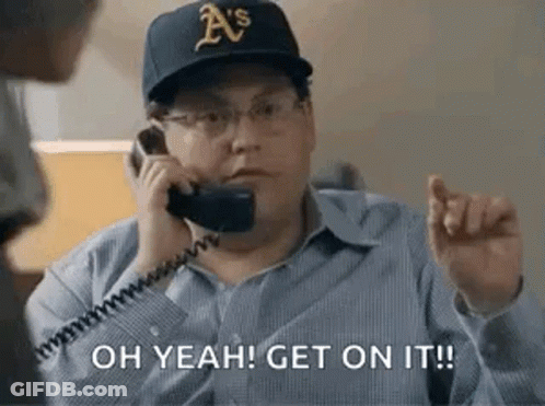 A Man In A Baseball Cap Is Talking On A Telephone And Says `` Oh Yeah ! Get On It ! '' GIF
