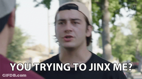 A Man In A Baseball Cap Is Talking To Another Man And Says You Trying To Jinx Me GIF