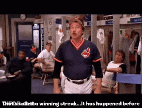 A Man In A Baseball Uniform Is Standing In A Locker Room And Says " That 'S Called A Winning Streak " GIF