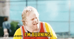A Man In A Basketball Jersey Is Saying I 'M Burning GIF