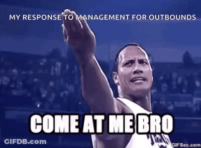 A Man In A Basketball Uniform Is Pointing Up With His Hand . GIF